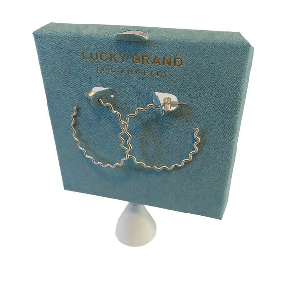 Lucky Brand Wavy Matte Silver Hoops. - Picture 3 of 5